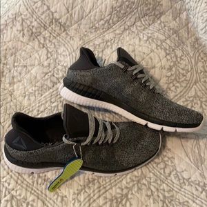 Brand new Reebok grey sneakers